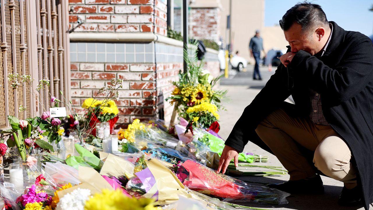 A makeshift memorial outside the scene of a deadly mass shooting at a ballroom dance studio on January 23, 2023, in Monterey Park, California. 