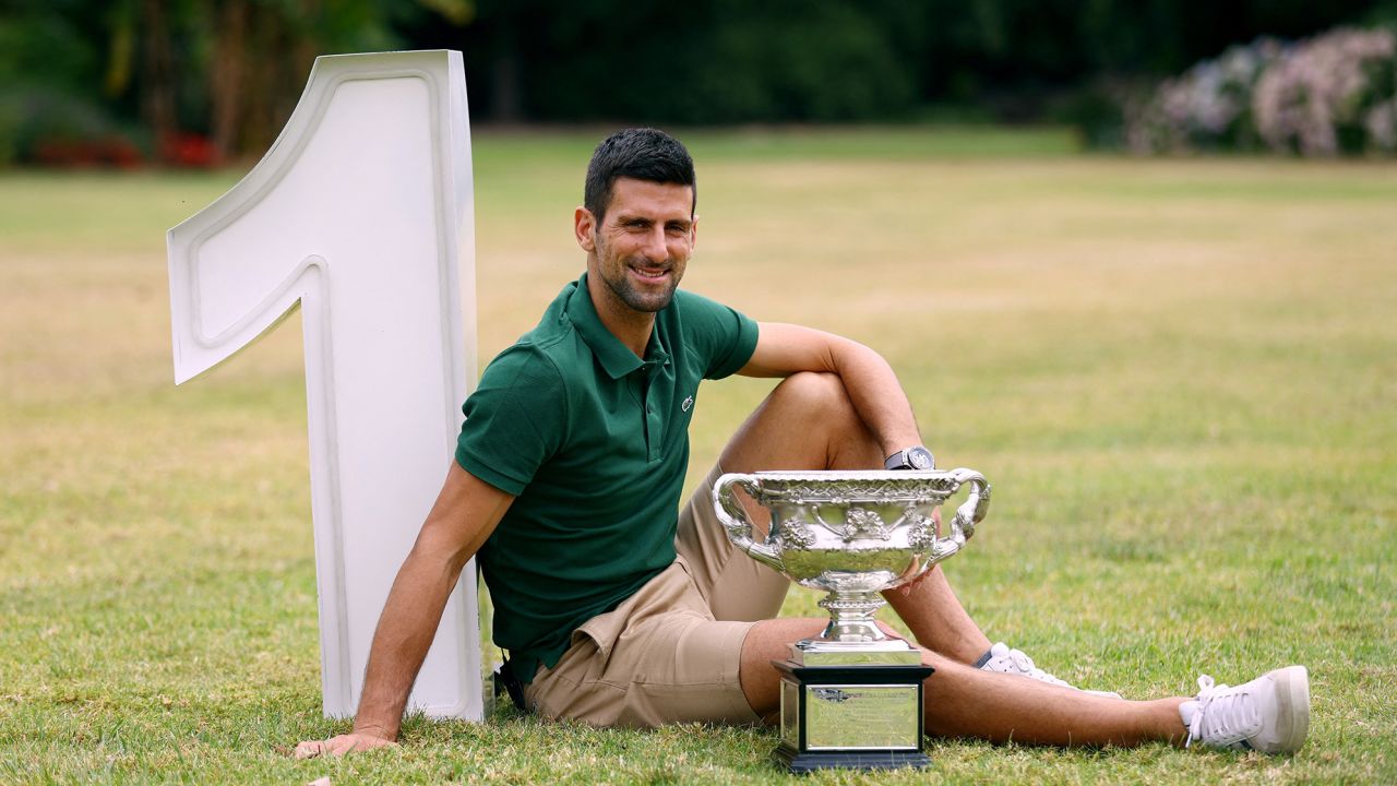 Novak Djokovic poses with the trophy after winning the Australian Open earlier in 2023. 