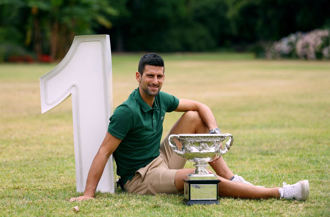 Australian Open champion Novak Djokovic poses with the trophy.