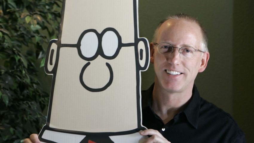 FLE - Scott Adams, creator of the comic strip Dilbert, poses for a portrait with the Dilbert character in his studio in Dublin, Calif., Oct. 26, 2006. Several prominent media publishers across the U.S. are dropping the Dilbert comic strip after Adams, its creator, described people who are Black as members of "a racist hate group" during an online video show. (AP Photo/Marcio Jose Sanchez, File)