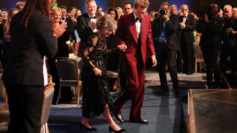 Austin Butler escorts Sally Field to the stage at the SAG Awards.
