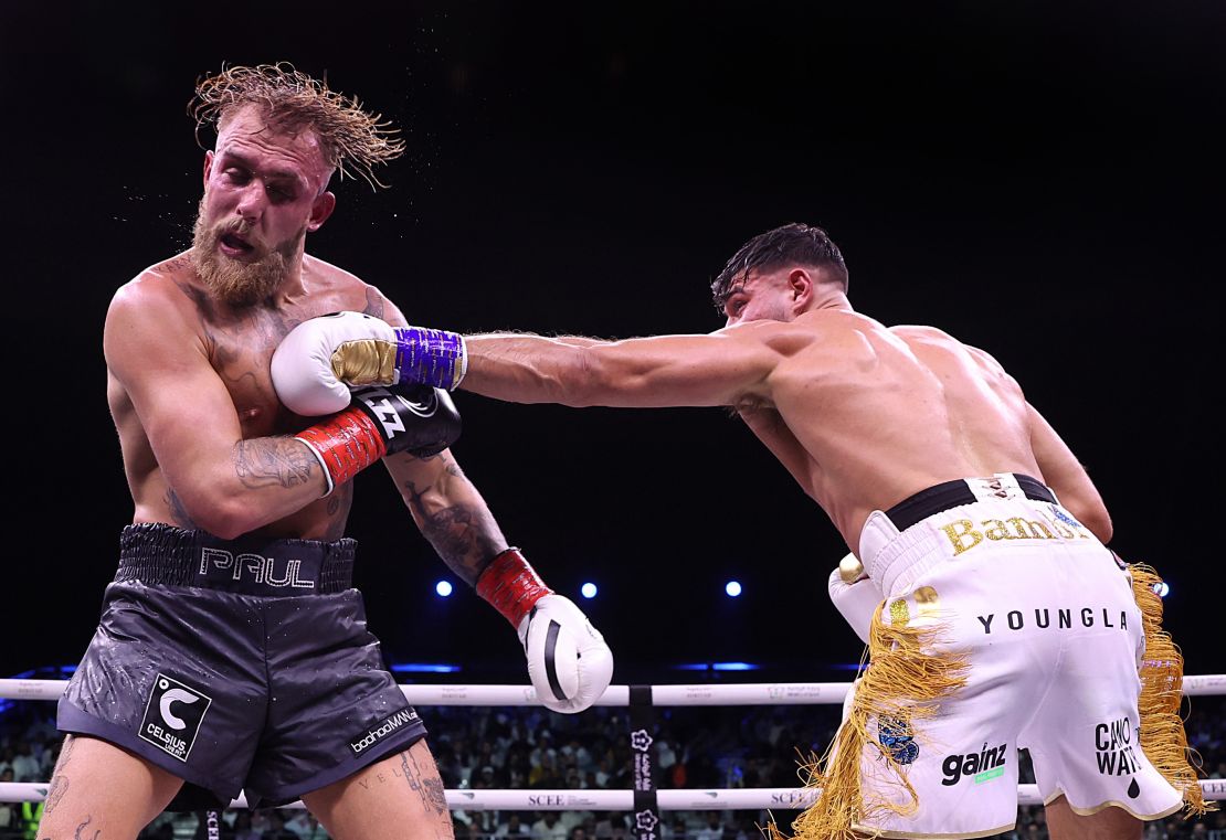 RIYADH, SAUDI ARABIA - FEBRUARY 26: Tommy Fury punches Jake Paul during the Cruiserweight Title fight between Jake Paul and Tommy Fury at the Diriyah Arena on February 26, 2023 in RIYADH, Saudi Arabia. (Photo by Francois Nel/Getty Images)