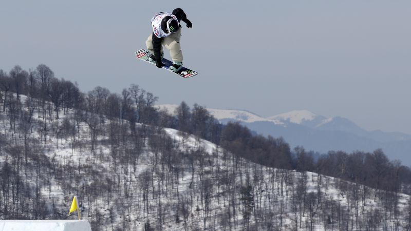 Mia Brookes, 16, becomes youngest snowboarding world champion after landing stunning trick