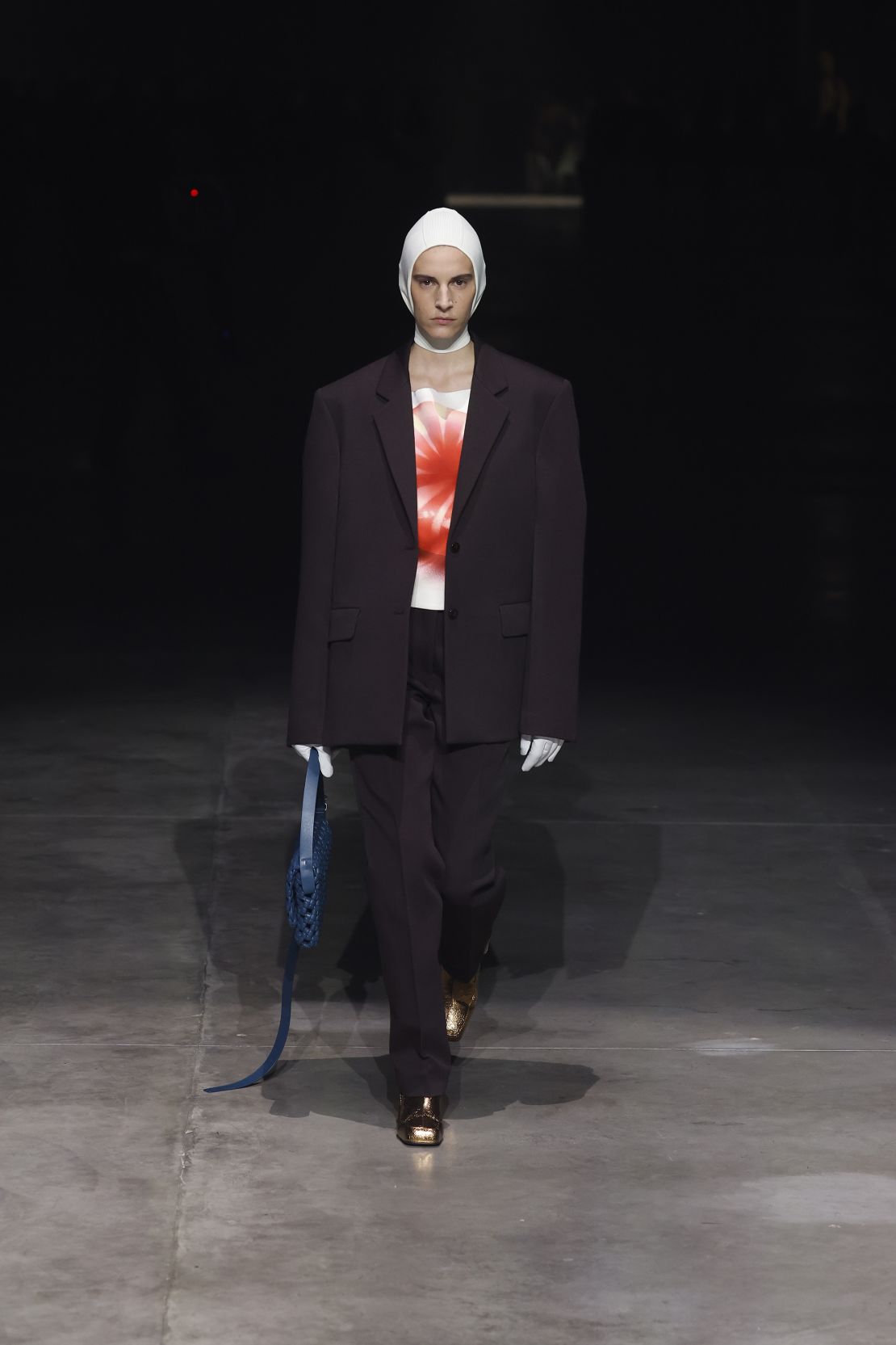 Distorted prints of cherries, bananas and boiled sweets were motifs in Jil Sander's latest collection.