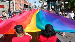 TAMPA, FL - MARCH 26: Revelers celebrate on the 7th Avenue during the Tampa Pride Parade in the Ybor City neighborhood on March 26, 2022 in Tampa, Florida. The Tampa Pride was held in the wake of the passage of Florida's controversial "Don't Say Gay" Bill. (Photo by Octavio Jones/Getty Images)