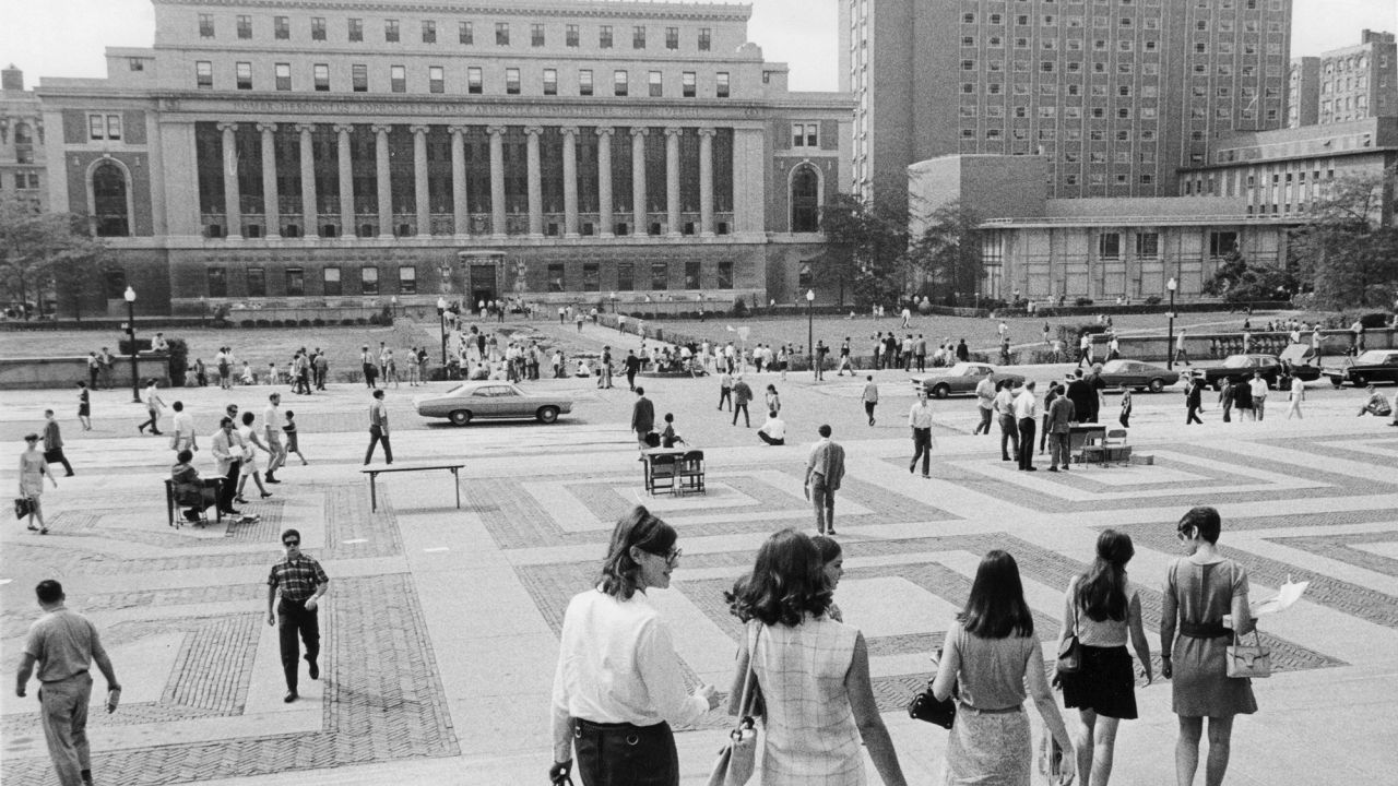 Students walk to classes on the first day of the Fall semester at Columbia University in New York on September 26, 1968.