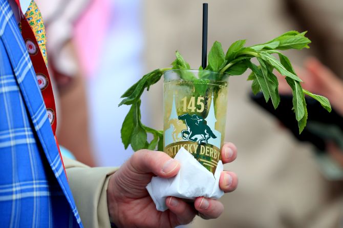 The mint julep has been a facet of the Kentucky Derby since the first hooves galloped the track of America's most famous horse race.  The drink combines mint and sugar, stirred with crushed ice and spirits such as bourbon and rum. It was made the event's official drink in 1939, but<a href="index.php?page=&url=https%3A%2F%2Fwww.cnn.com%2Ftravel%2Farticle%2Fcocktail-history-mint-julep-kentucky-derby%2Findex.html" target="_blank"> its ties to the racetrack</a> date back to the early 1820s.