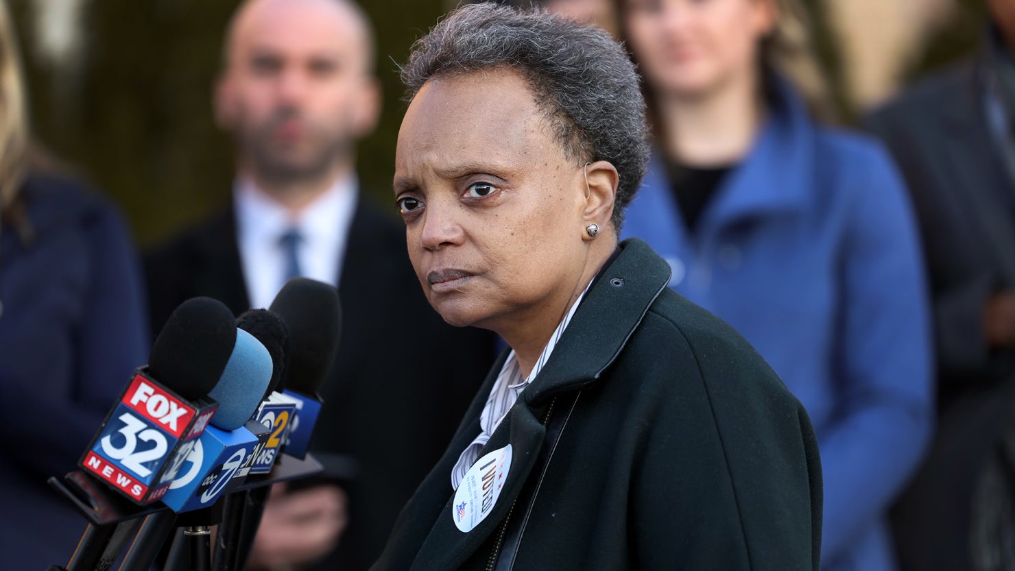 Chicago Mayor Lori Lightfoot speaks with the press after casting her ballot at an early voting location on February 20, 2023.