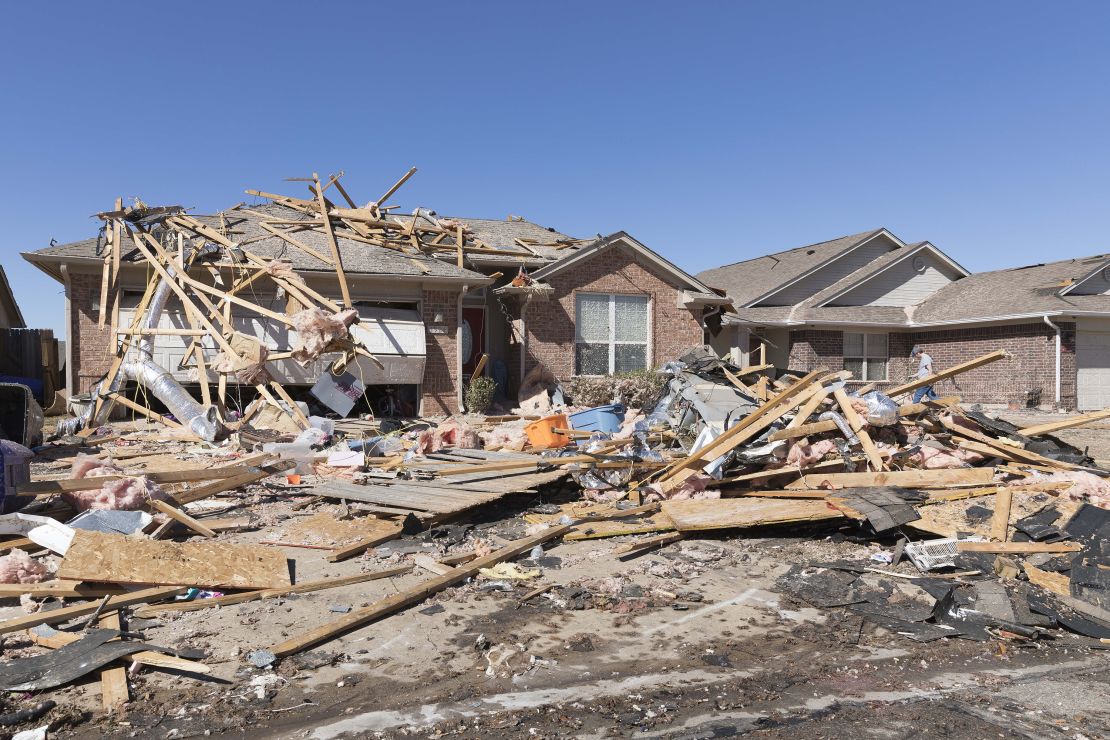A home sits damaged in Norman, Oklahoma, Monday.