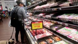 A person shops in the beef section of a supermarket on February 13, 2023 in Los Angeles, California. 