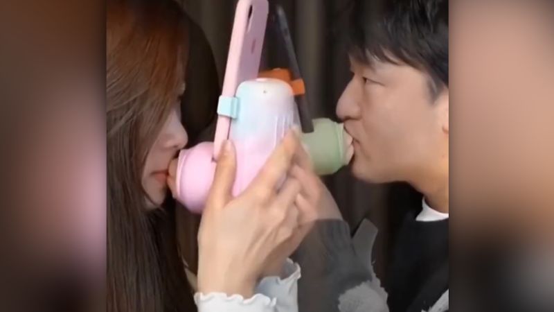 NextImg:Video: Chinese kissing device lets recipients feel your kisses from afar | CNN Business