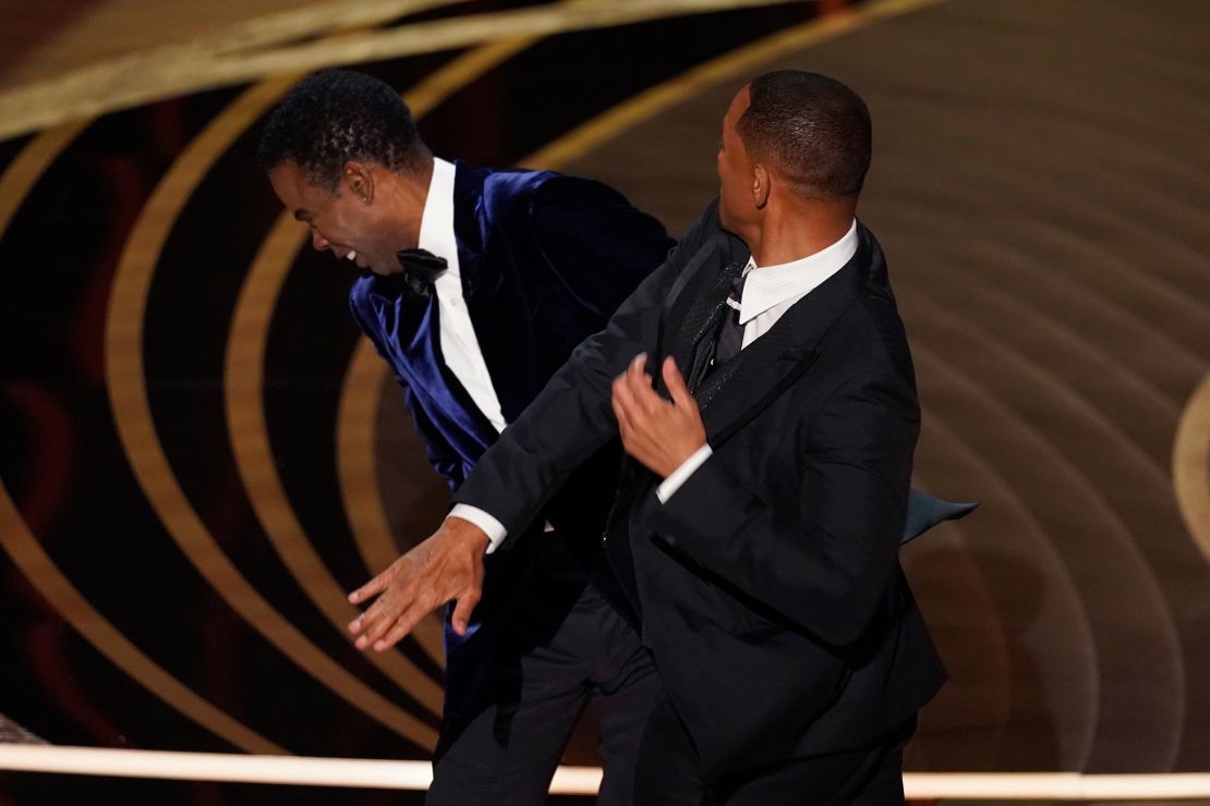 Will Smith hits presenter Chris Rock during the 94th Annual Academy Awards on  March 27, 2022. 