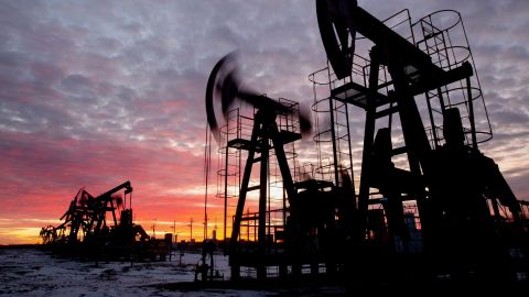 Oil pumping jacks operate in an oilfield near Russia's Neftekamsk on Nov. 19, 2020. 
