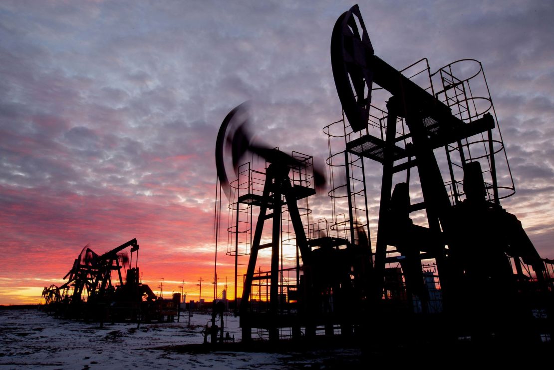 Oil pumping jacks operate in an oilfield near Russia's Neftekamsk on Nov. 19, 2020. 