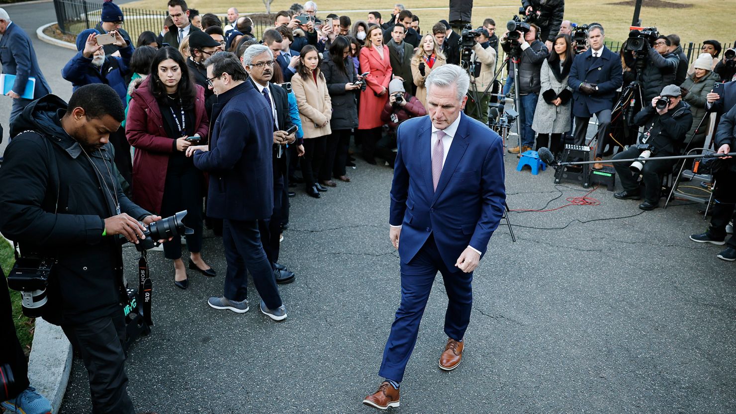Speaker of the House Kevin McCarthy walks away after talking to reporters following his hour-long meeting with U.S. President Joe Biden at the White House February 1, 2023 in Washington.