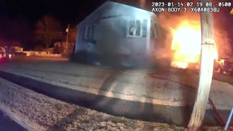 NextImg:Video: Bodycam captures moment house explodes with firefighters inside | CNN