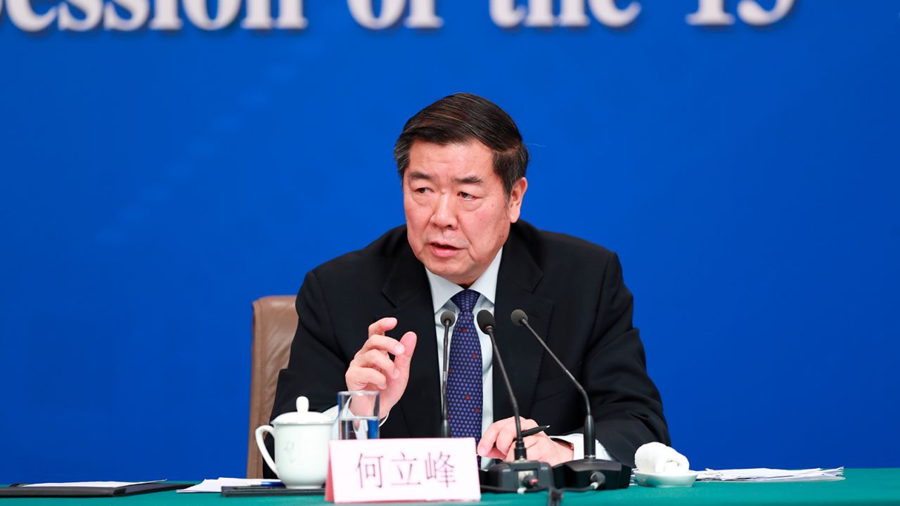 He Lifeng addresses a press conference in Beijing in March 2019. 