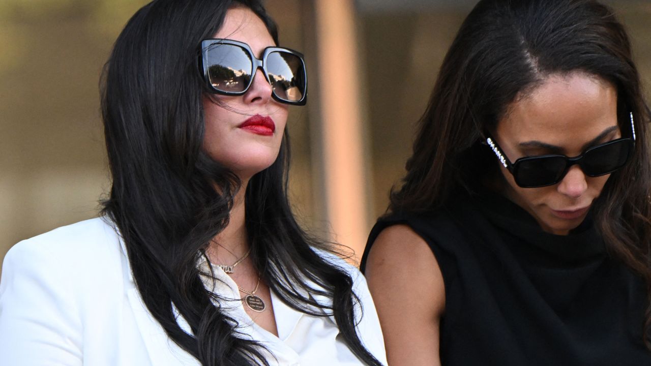 Vanessa Bryant, wife of the late Los Angeles Lakers basketball player Kobe Bryant, and close friend Sydney Leroux (R) depart the court house in Los Angeles, California, on August 24, 2022.