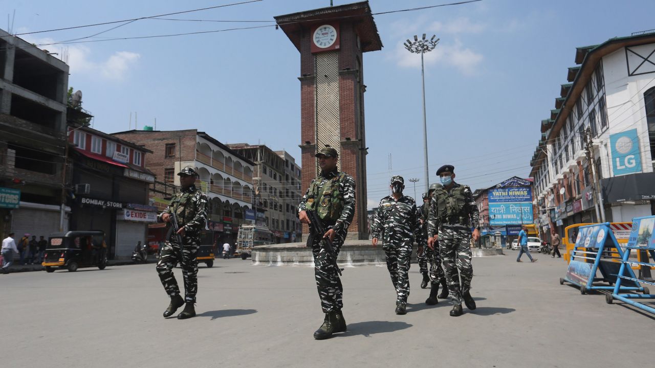 Paramilitary soldiers patrol a street during a protest march on June 10, 2022 in Srinagar, India.