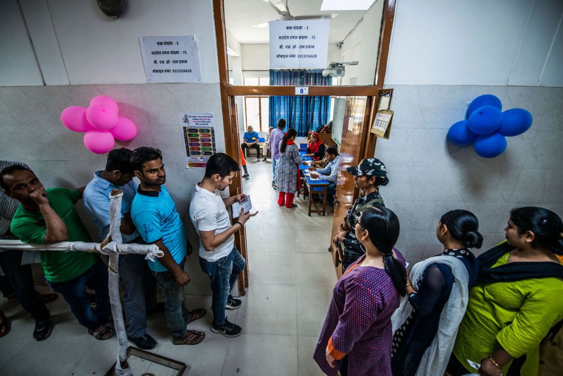 People line up to cast their votes for first phase of India's General Elections in April 2019.