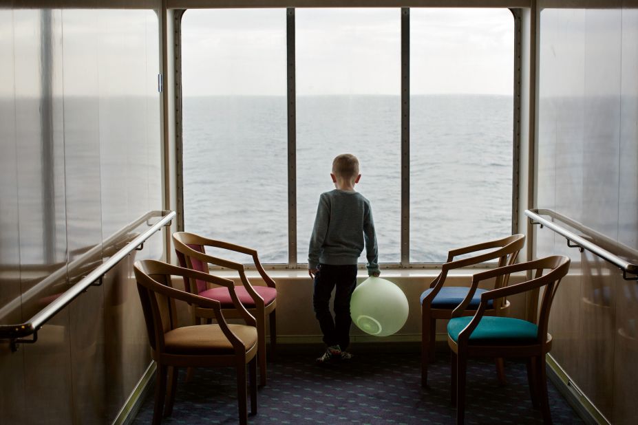 A young boy on a ferry traveling from the Faroe Islands' capital, Tórshavn, to the archipelago's southernmost island, Suduroy.
