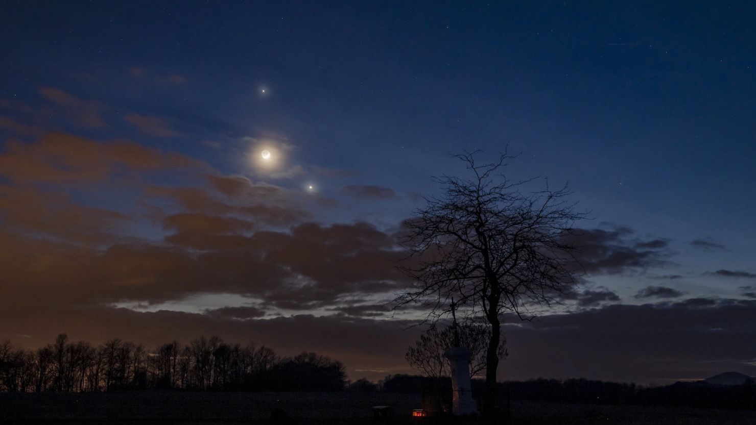 Jupiter, the moon and planet Venus, further right, observed on the sky photographed near Salgotarjan, Hungary, on February 22.
