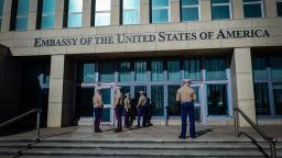 US Marines stand outside the Embassy of the United State of America in Havana, on February 21, 2018. / AFP PHOTO / ADALBERTO ROQUE        (Photo credit should read ADALBERTO ROQUE/AFP via Getty Images)