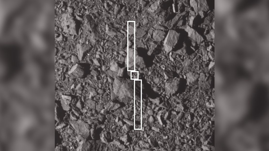 The DART spacecraft took an image of Dimorphos' surface three seconds before impact. The squares represent the footprint where DART hit the asteroid.
Large boulders, including one  about 6.5 meters (21 feet), were near the impact site.