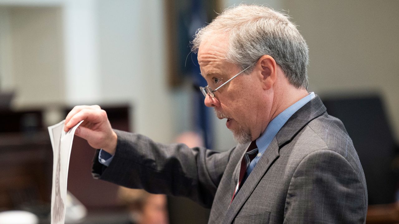 Prosecutor Creighton Waters holds up a composite sketch Alex Murdaugh helped make during closing arguments in Murdaugh's double murder trial at the Colleton County Courthouse on Wednesday, March 1, 2023, in Walterboro, S.C. The 54-year-old attorney is standing trial on two counts of murder in the shootings of his wife and son at their Colleton County home and hunting lodge on June 7, 2021.