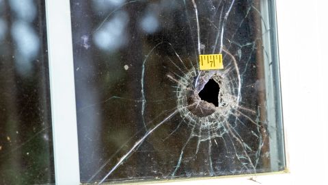 Bullet holes are seen in the glass at the Moselle property on March 1, 2023