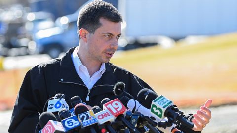 U.S. Transportation Secretary Pete Buttigieg speaks as he visits the site of the derailment of a train carrying hazardous waste in East Palestine, Ohio, U.S., February 23, 2023. REUTERS/Alan Freed