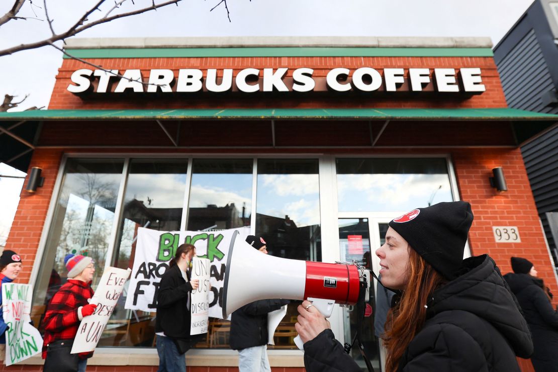 Starbucks workers attend a rally as they go on a one-day strike outside a store in Buffalo, New York, November 17, 2022. 