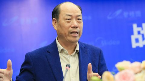 Yang Guoqiang, founder of Country Garden, attends a signing ceremony in November 2017 in Guangdong province.