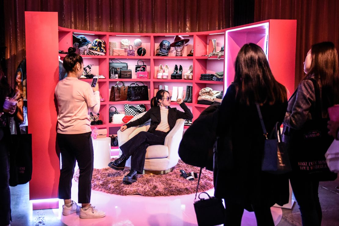 Shoppers taking photos at a Shein pop-up store in New York in October. Shein has seen its popularity soar in the United States as its trendy apparel wins over customers.