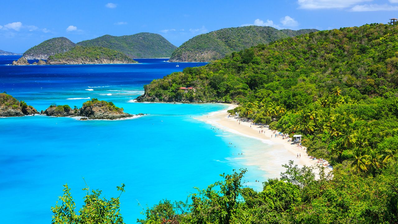 Virgin Islands National Park, with Trunk Bay pictured, saw a nearly 40% drop in visits last year.