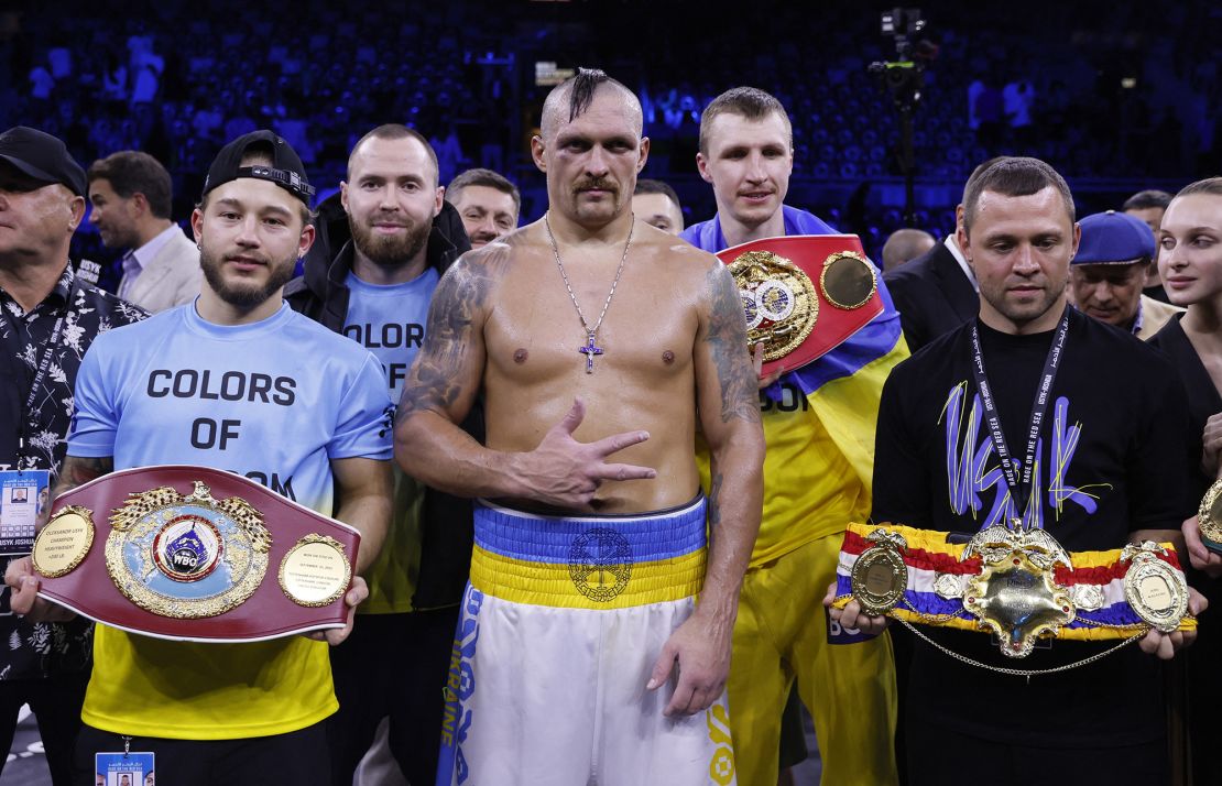 Boxing - Oleksandr Usyk v Anthony Joshua - WBA, WBO and IBF heavyweight world title - King Abdullah Sports City Arena, Jeddah, Saudi Arabia - August 20, 2022 
Oleksandr Usyk celebrates with his team after winning his fight against Anthony Joshua Action Images via Reuters/Andrew Couldridge