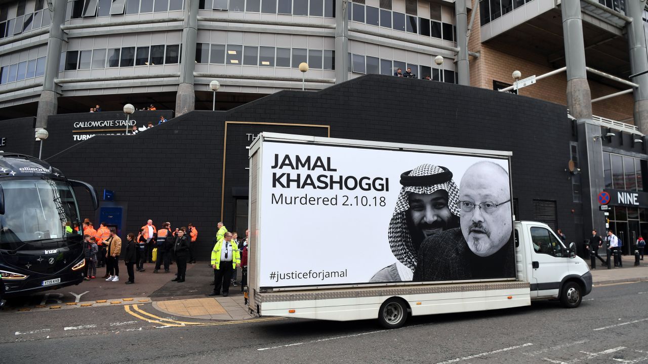 A van protesting against the Saudi Arabian owners of Newcastle United drives past the stadium during the Premier League match between Newcastle United and Tottenham Hotspur at St. James' Park on October 17, 2021.