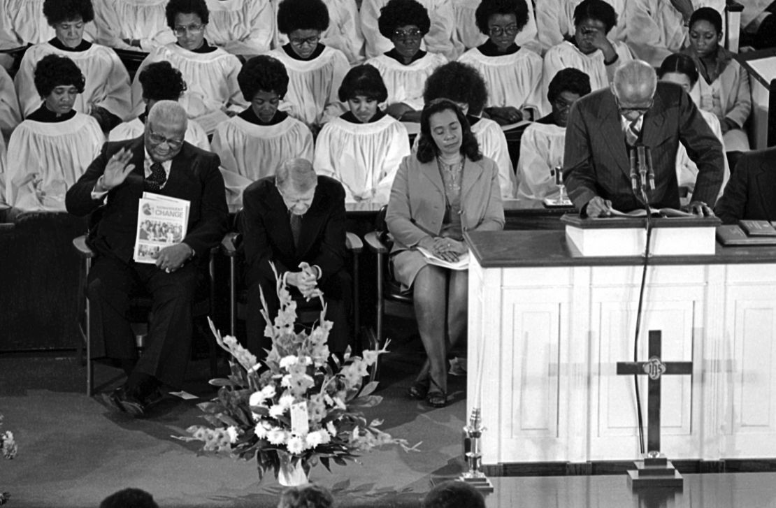 The Rev. Martin Luther King Sr., left, President Jimmy Carter and Coretta Scott King pray at Ebenezer Baptist Church in Atlanta on January 14, 1979. Carter  that day was awarded the Martin Luther King Jr. Non-Violent Peace Prize. 
