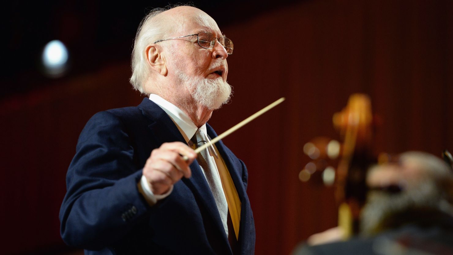 Composer John Williams, seen here performing on stage in December 2016 in Hollywood, California, spoke with CNN's Chris Wallace about rumors of his retirement. 