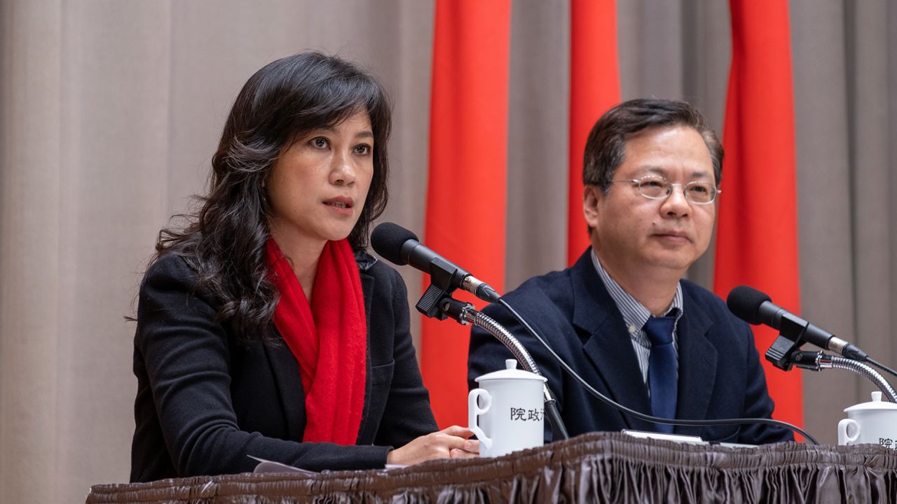 Kolas Yotaka, left, in her role as a government spokesperson, with Administrative councilor Kung Ming-hsin in Taipei on February 2, 2020.