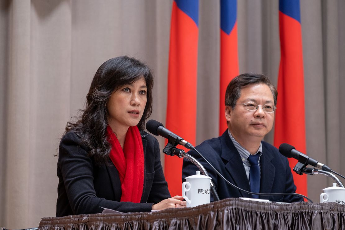 Kolas Yotaka, left, in her role as a government spokesperson, with Administrative councilor Kung Ming-hsin in Taipei on February 2, 2020.