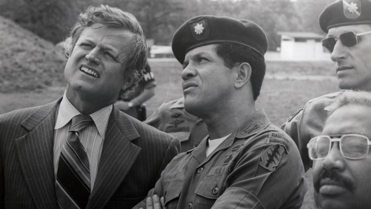 Sen. Ted Kennedy had a discussion with Maj. Paris Davis during a visit to Vietnam, circa late 1960s. (Photo courtesy of the Davis Family)