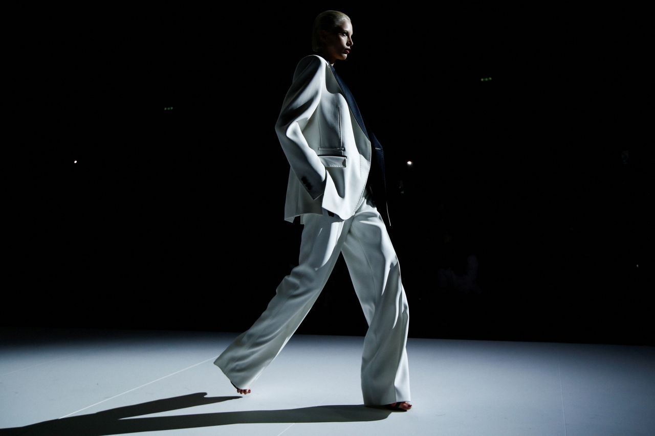 A model struts while sporting a look from Dolce & Gabanna during Milan Fashion Week in Italy on Saturday, February 25.