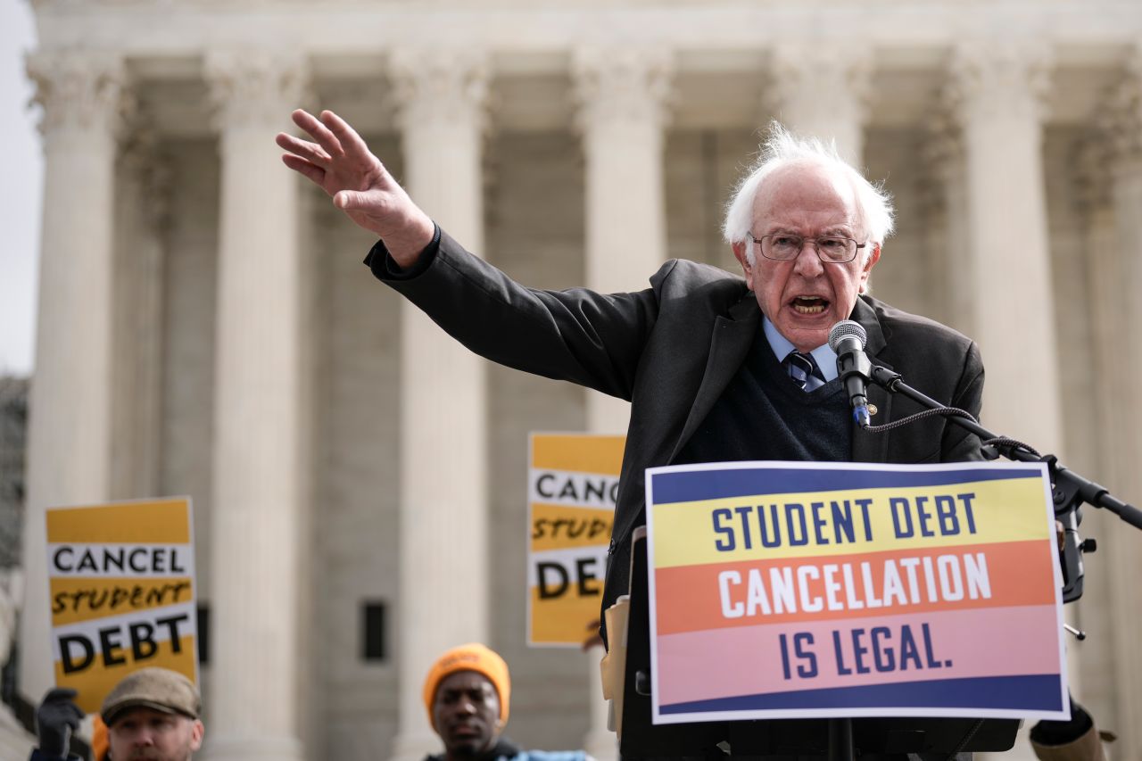 US Sen. Bernie Sanders of Vermont speaks in front of the Supreme Court during a rally in support of the Biden administration's student debt relief plan on Tuesday, February 28. The Supreme Court heard oral arguments in two cases challenging President Joe Biden's student loan debt forgiveness program, which remains on hold after a lower court blocked the plan in November.