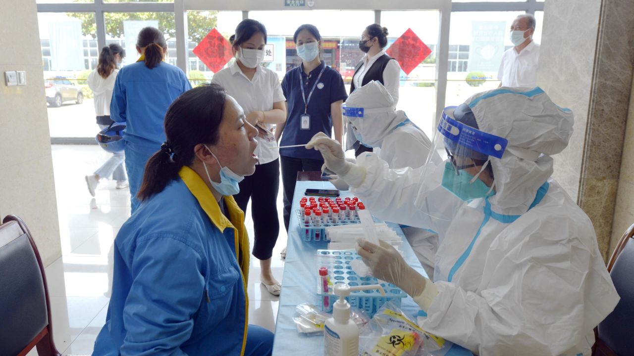 Wuxi residents get tested for Covid in July, 2022. 