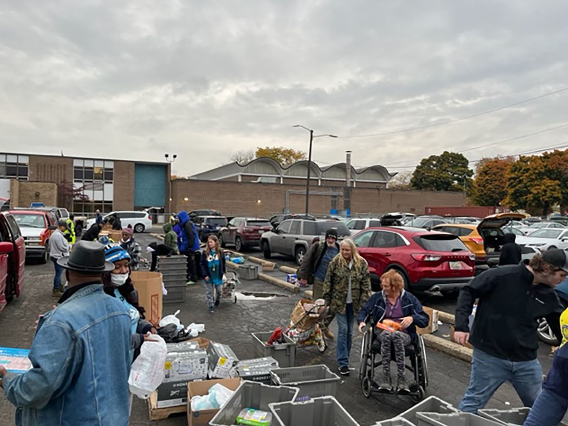 Locals have been showing up to this River Rouge, Michigan mobile food drive on foot and even via wheel chair to pick up food each week.