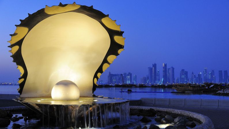 <strong>Monument to the past:</strong> Today the pearling industry has long-vanished from Qatar, but reminders are everywhere -- like the giant sculpture at the entrance to Doha's Dhow Harbour