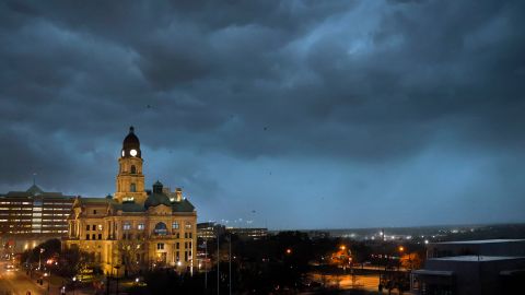 Debris flies through the air near the Tarrant County Courthouse in downtown Fort Worth, Texas, on March 2, 2023. 