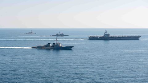 In this image provided by the South Korean Defense Ministry, the US aircraft carrier USS Ronald Reagan and South Korean warships seen during a combined US-Korea naval exercise on September 29.