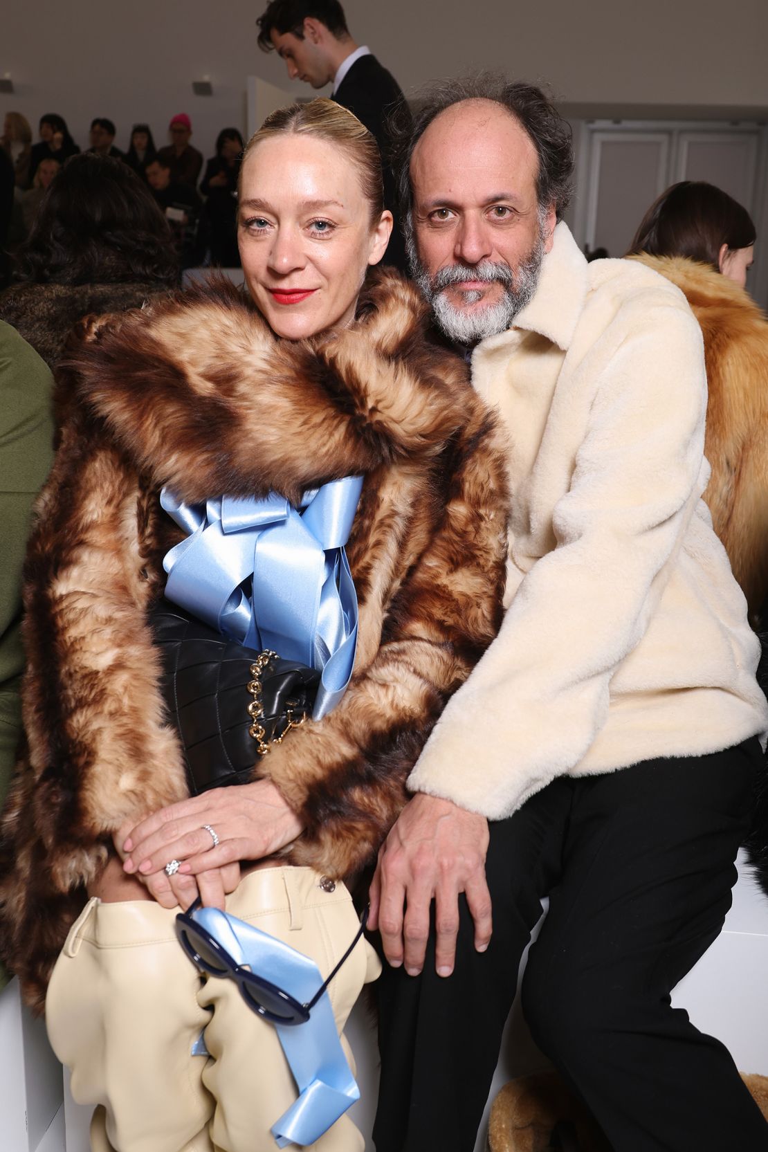 Chloë Sevigny and director Luca Guadagnino attend the Loewe runway on March 3, 2023.